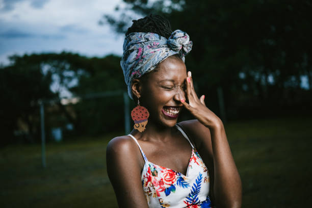 Beautiful african-american young woman Portrait of a Beautiful afro-american young woman embarrassment stock pictures, royalty-free photos & images