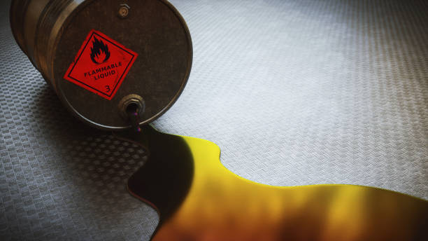 leaking barrel spilling flammable liquid on shiny flooring - toxic waste toxic substance drum barrel imagens e fotografias de stock