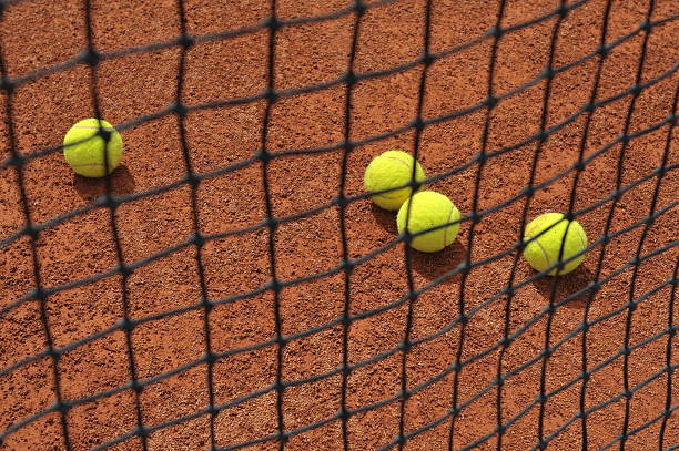 istock Tennis balls on red slag 106463587