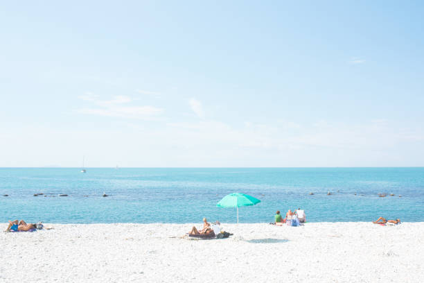 sunny beach of marina di pisa, italy. - marina di pisa imagens e fotografias de stock