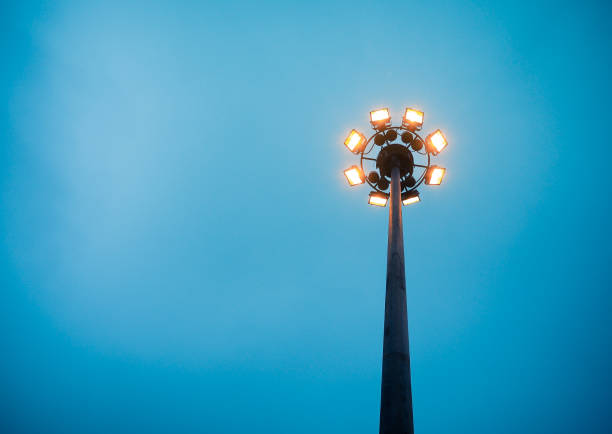 istock Luminaire ring with orange lighting fixtures. 1064639826
