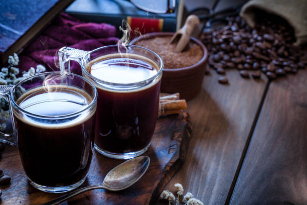 Coffee backgrounds: coffee cup on rustic wooden table with copy space