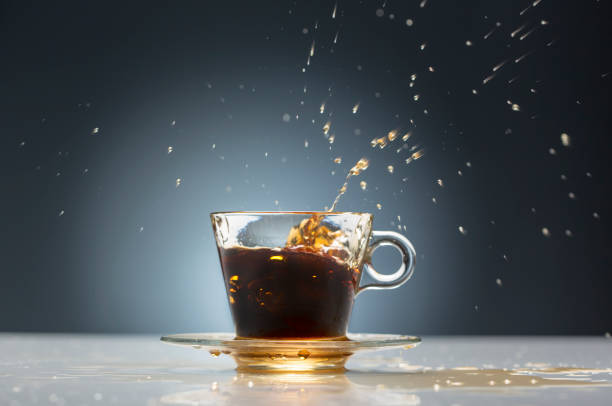 istock Splash of espresso coffee in a cup 1064645522