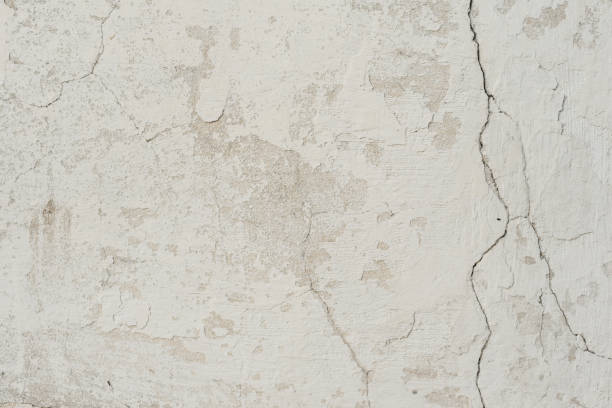istock Wall fragment with attritions and cracks 1064650606