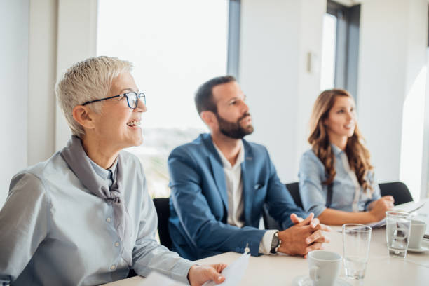 istock Happy coworkers at office 1064651466