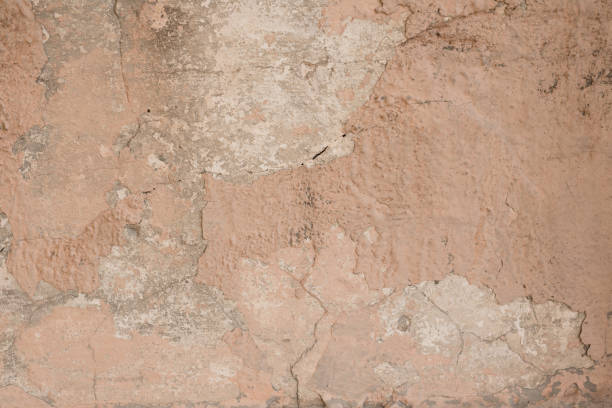 istock Wall fragment with attritions and cracks 1064656532