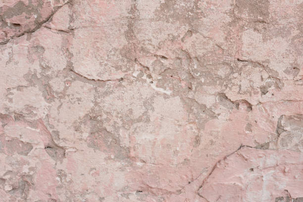 istock Wall fragment with attritions and cracks 1064656686