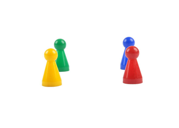 istock Pawns in a game on white background 1064658156