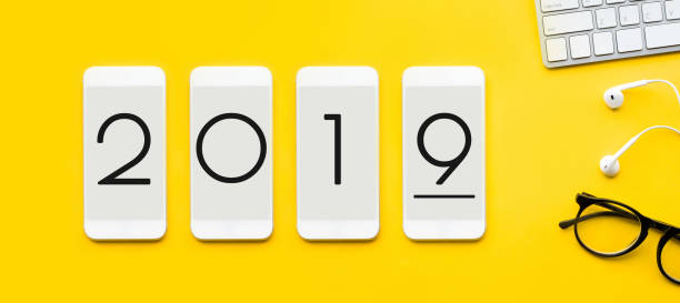 istock 2019 concepts with text on mock up smartphone and modern accessories,supplies on color background.flat lay design.business 1064658214