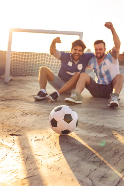 istock Friends watching a football match 1064661390