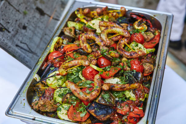 istock sausages with grilled vegetables 1064662330