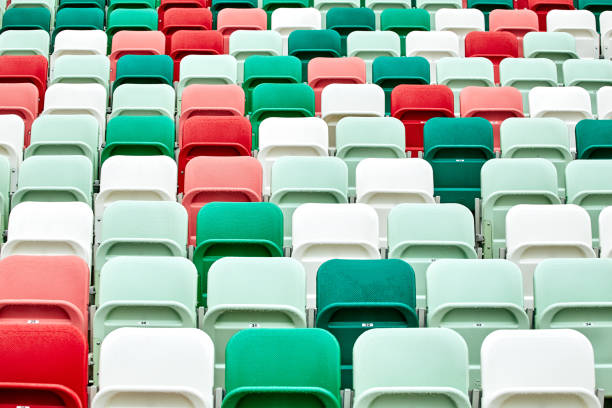 istock colored chairs at a football stadium 1064664530
