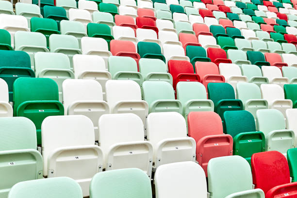 istock colored chairs at a football stadium 1064665742