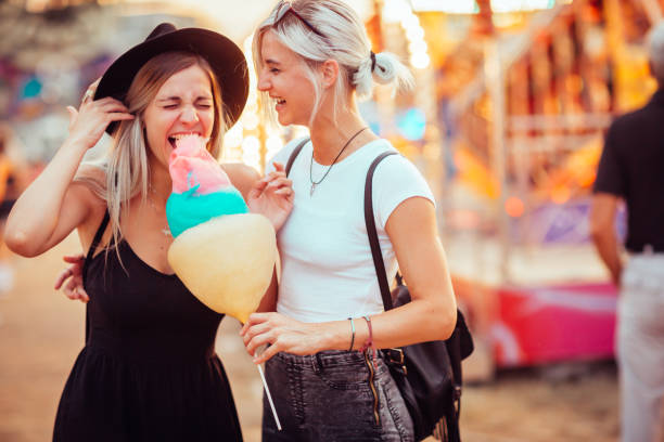 istock Friends in amusement park 1064668264