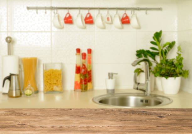 istock Wooden table top on blur interior background 1064669982