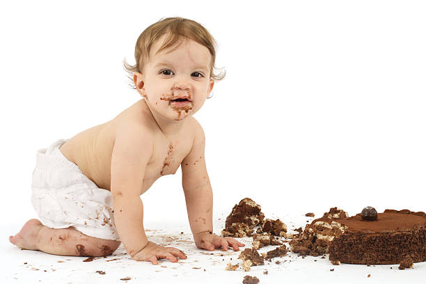 istock Baby and birthday cake 106467019
