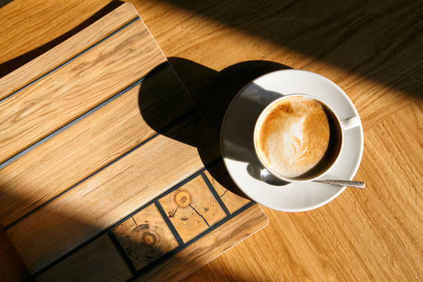 istock coffee on the table, breakfast, in the sun 1064673520