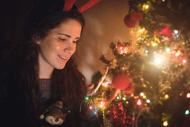 istock Cute girl next to a Christmas tree 1064680040