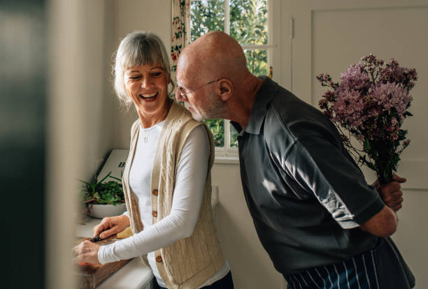 istock Romantic senior couple at home having fun 1064683210