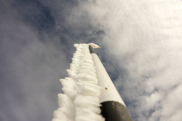 Frozen signs in the mountainsagainst blue sky, in winter