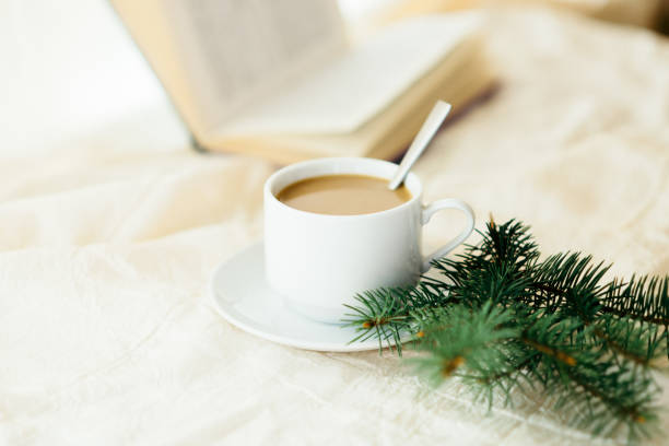 istock cup of tea with milk on a textile background with a knitted sweater and  needles 1064688532