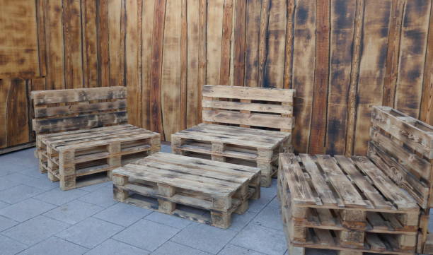 istock Table and three benches made of transport pallets 1064703846