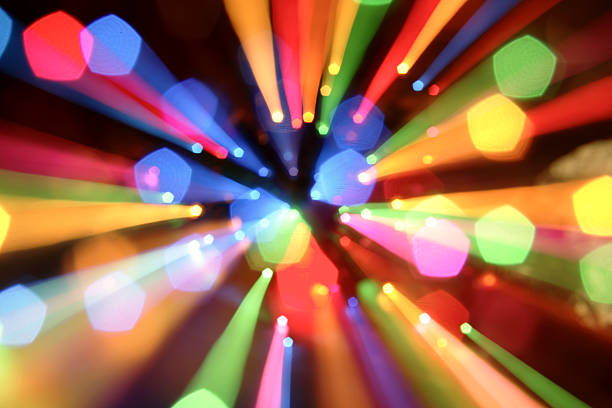 istock Colorful ray of lights that passes through several holes 106470946