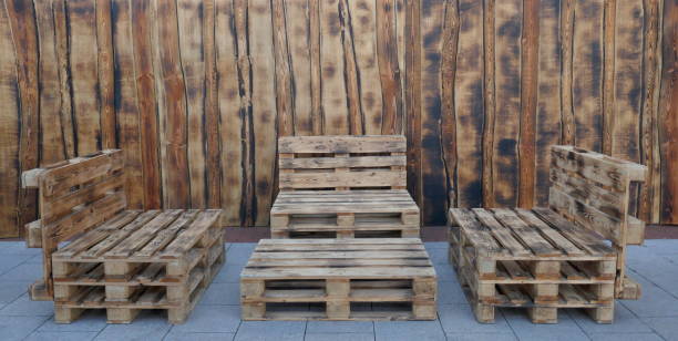 istock Table and three benches made of transport pallets 1064711106