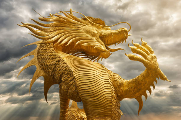 istock Golden Chinese dragon with sunset 1064711294