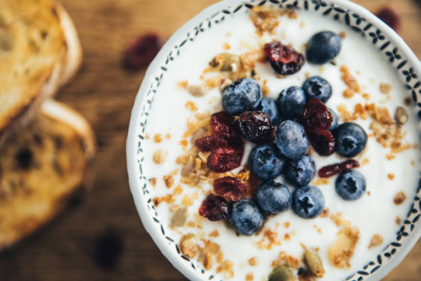 istock Healthy Breakfast, Yogurt, Granola And Toasts 1064715886