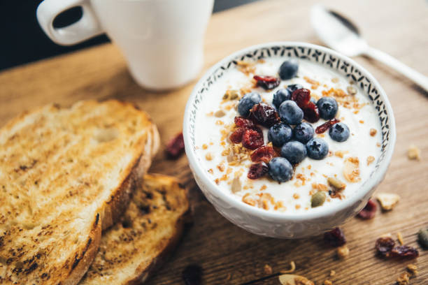 Breakfast, Yogurt, Granola With Toasted Bread And Coffee