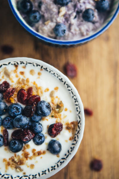 istock Healthy Breakfast, Yogurt With Granola And Overnight Oatmeal 1064716590
