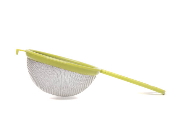 istock Round metal strainer isolated on white background. 1064721006