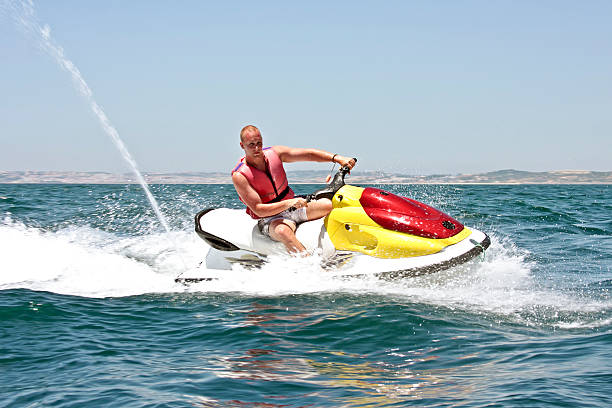 istock Young guy cruising on a jet ski 106472996