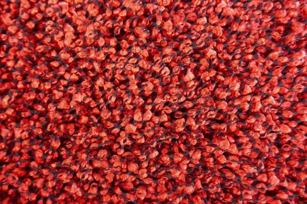 istock Carpet fibers,red. Close-up, background and texture 1064735828