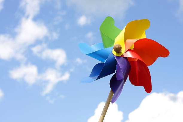 istock Macro of a colorful pinwheel under a cloudy blue sky 106473828