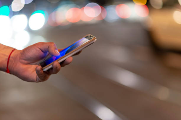 istock Close View of Man with Smart Phone 1064740426