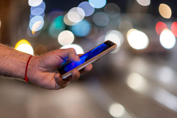 istock Close View of Man with Smart Phone 1064740440