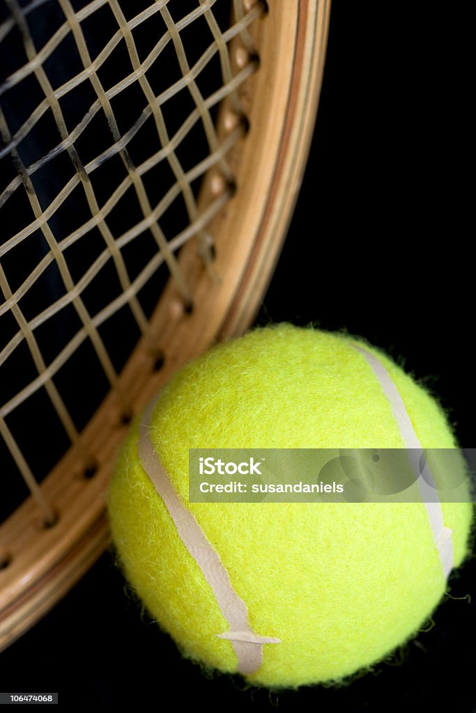 tennis tennis ball and partial racquet, macro, differential focus Color Image Stock Photo