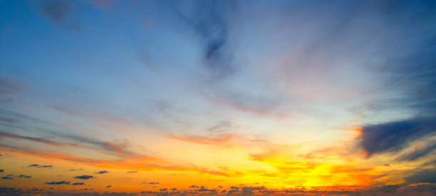 istock Cloudy sky and bright sunrise over the horizon. 1064740688