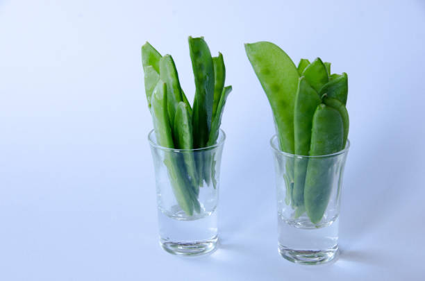 istock Snow peas in a little glass 1064747688