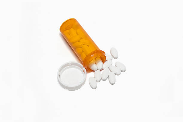 Looking down on a spilled prescription  statin photos stock pictures, royalty-free photos & images