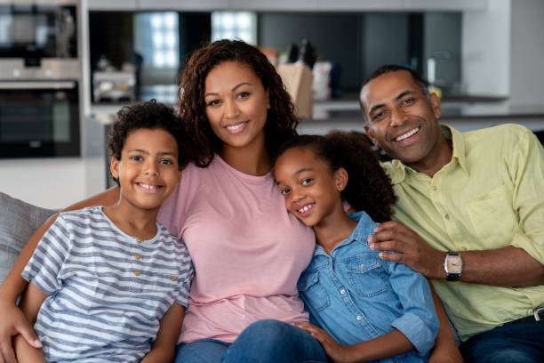 istock Happy black family at home 1064761758
