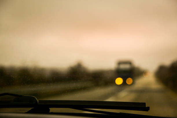 istock Fog on road - Car in fogy 1064763746