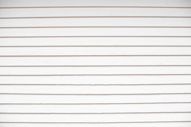 Wooden house siding painted white horizontal lines or stripes