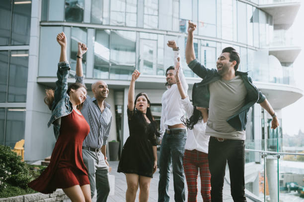 istock Millennial Indian Young Professionals Cheer 1064763872