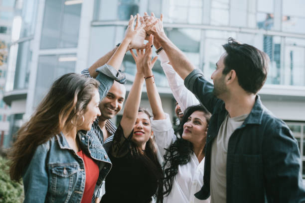 istock Millennial Indian Young Professionals Cheer 1064763878