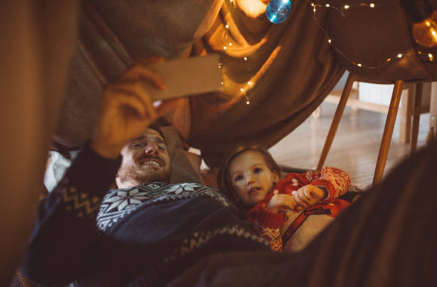 istock Love Christmas in blanket tent 1064766640