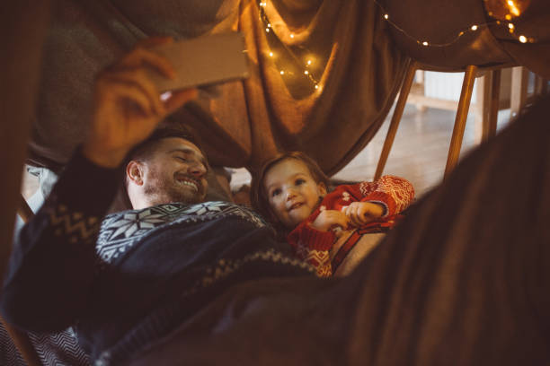 istock Love Christmas in blanket tent 1064766666