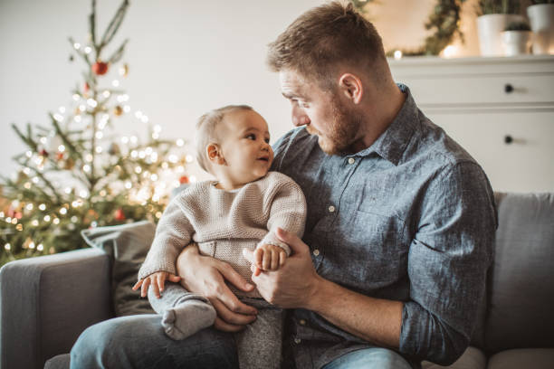 istock Christmas at home with baby boy 1064766998